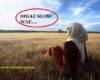 Muslim woman wearing hijab relaxing on savanna